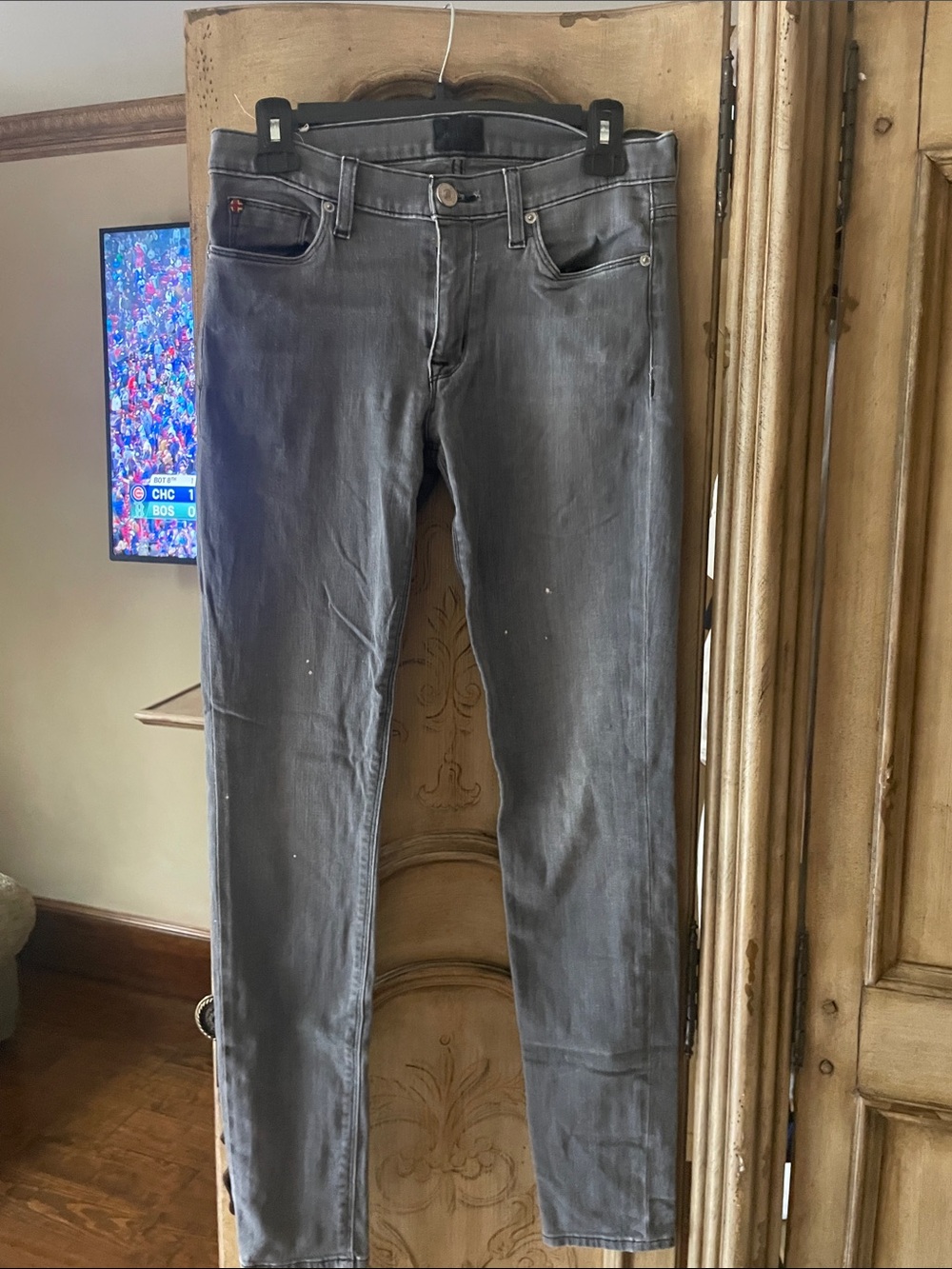 Women’s Slim Fit Gray Jeans have white spots on front